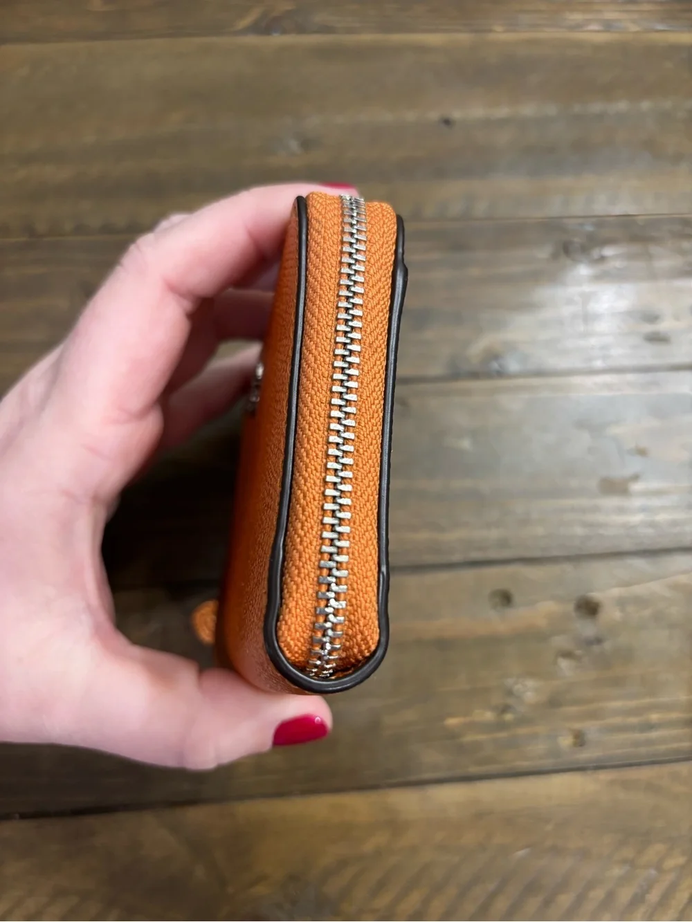 Coach Pebbled Leather Zip Wallet in Metallic Orange
